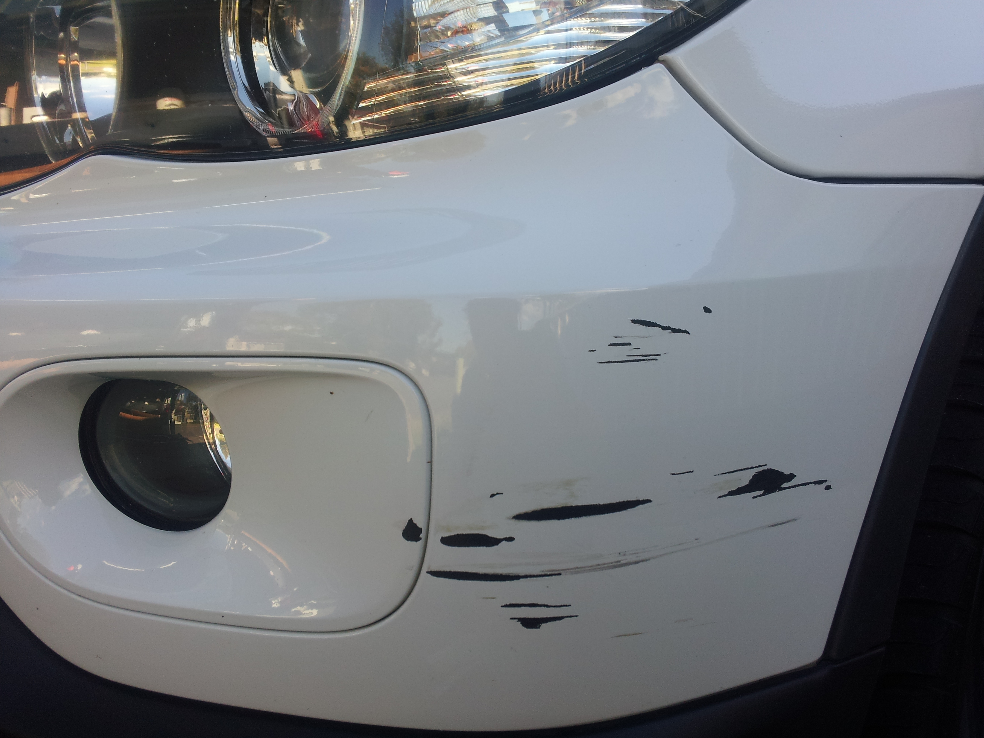 Bmw front bumper scratch repair #6